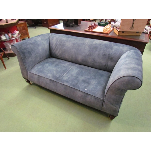 4125 - Circa 1860 a scroll arm drop-end velvet upholstered Chesterfield two seater sofa on ring turned maho... 