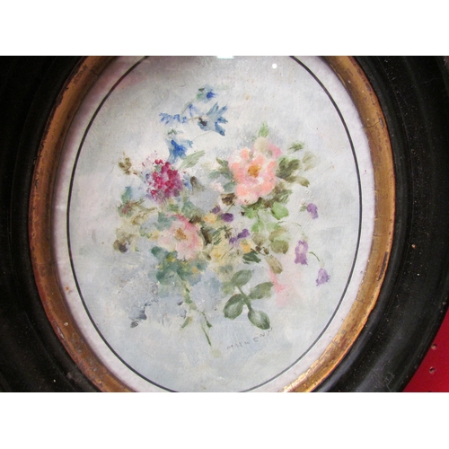 4127 - Two floral oils on board. Ebonised oval frames. 22cm x 17cm image sizes