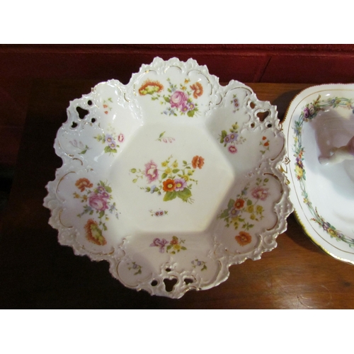 4162 - A Davenport hand-painted dish depicting flowers enriched with gilt, a hard paste porcelain dish and ... 