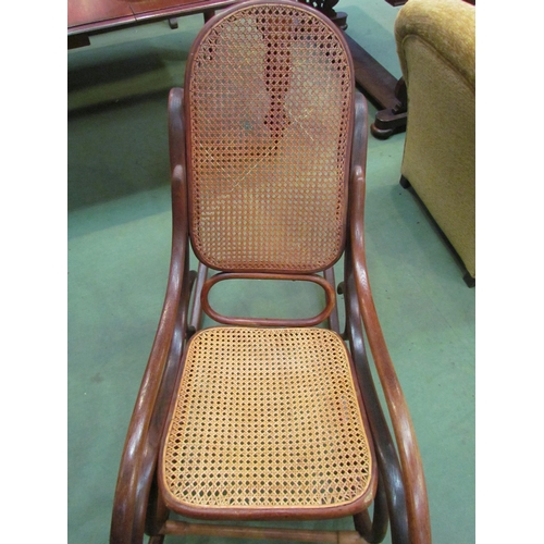 4191 - A bentwood bergere back and seat rocking chair. Caning a/f  (E) £20-30