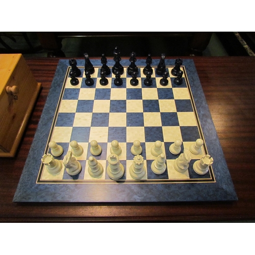 4193 - A boxed chess set with board. King- 10cm height