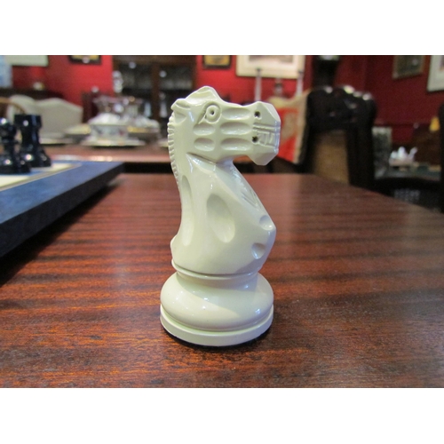 4193 - A boxed chess set with board. King- 10cm height