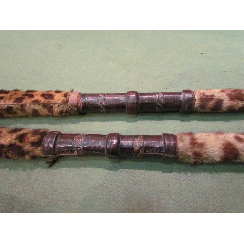 4197 - A pair of ethnic spears with animal fur sections   (R) £50