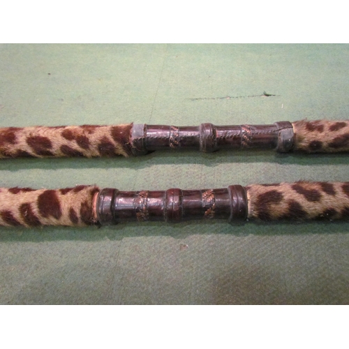 4197 - A pair of ethnic spears with animal fur sections   (R) £50