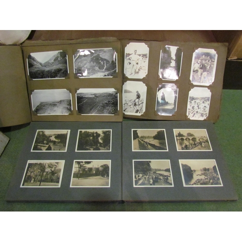 4240 - A box of photograph albums, mainly filled, depicting family groups, motor cars, etc early 20th Centu... 