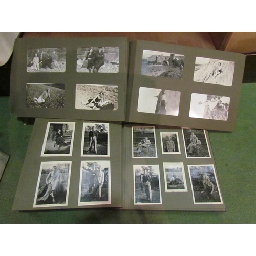 4240 - A box of photograph albums, mainly filled, depicting family groups, motor cars, etc early 20th Centu... 