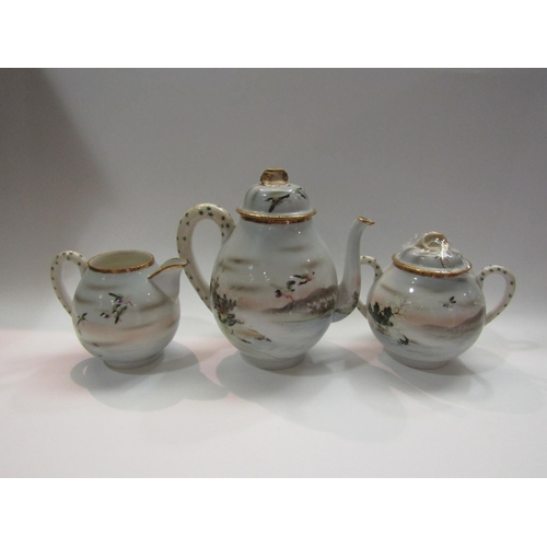 4289 - A Japanese porcelain three piece coffee set, decorated with birds, together with a pair of Satsuma s... 