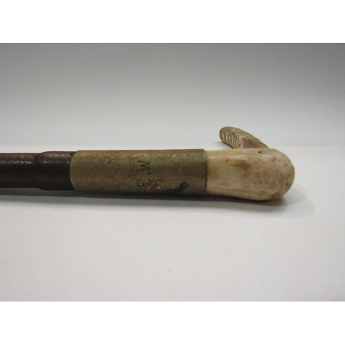 4305 - A riding crop and a mortar (2)