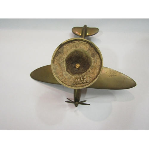 4307 - A brass desk top model of a Spitfire, on stand, 11cm tall, 19cm long