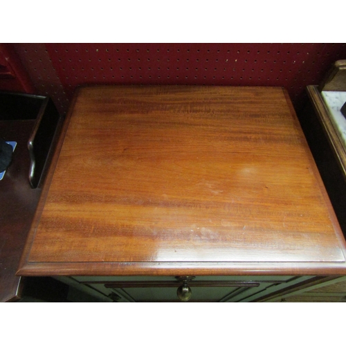 4067 - An Edwardian flame mahogany cabinet the single drawer and cupboard door over cabriole foot supports,... 