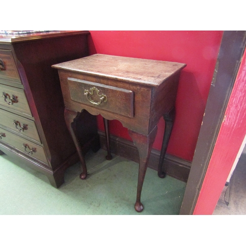 4100 - An oak side table with single drawer on cabriole legs to pad feet, a/f, 65cm tall x 45cm wide x 28cm... 