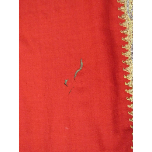 4180 - A late 19th Century Indian gold thread embroidered red felt shawl (worn)