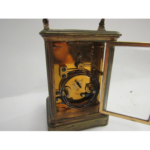 4329 - A French twin train carriage timepiece, 13cm tall