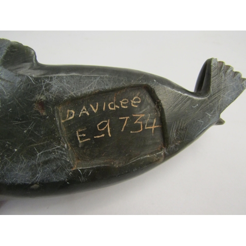 4337 - DAVID LEE (XX) A carved and polished stone figure of a seal, signed to base and marked 'E-9,734' to ... 