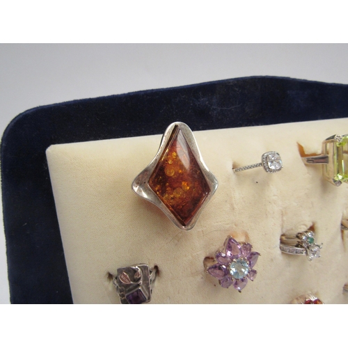 4346 - A quantity of dress rings mainly 925 examples including amber and mystic topaz