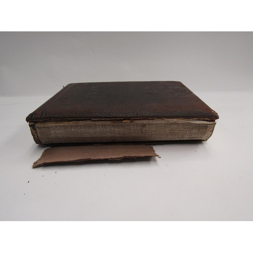 4348 - A carte de visite with original Victorian black and white photographs (spine poor) with metal clasp