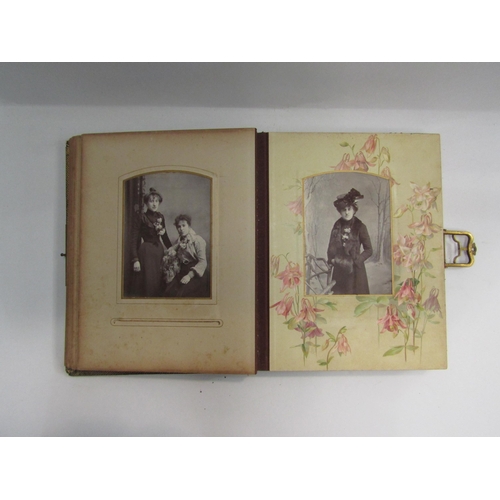 4348 - A carte de visite with original Victorian black and white photographs (spine poor) with metal clasp