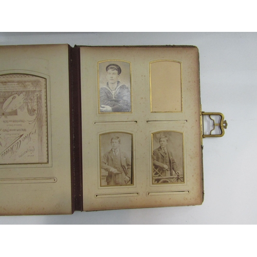 4348 - A carte de visite with original Victorian black and white photographs (spine poor) with metal clasp