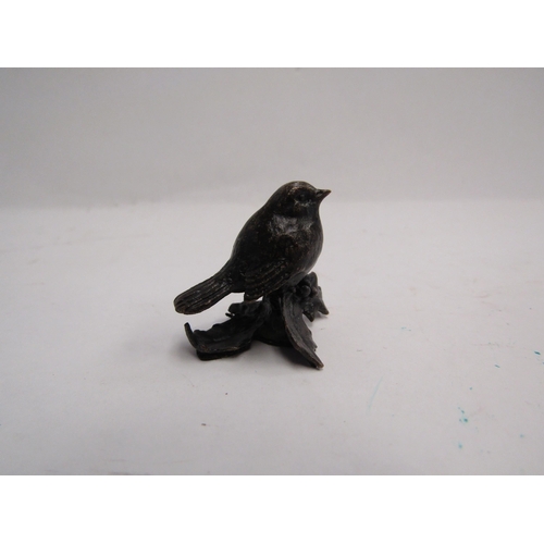 4351 - A miniature solid bronze Robin on a branch boxed with bag. 3cm   (R) £25