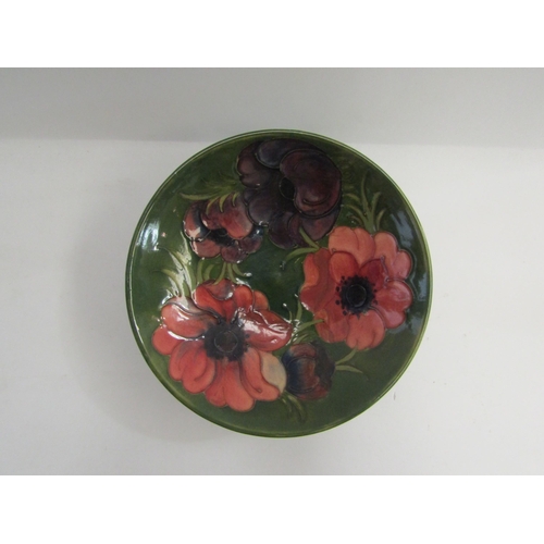 4356 - A Moorcroft anemone pattern bowl and two Moorcroft coloured dishes