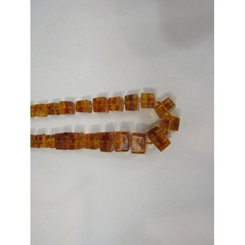 4383 - A faceted Baltic amber necklace, 80cm long   (R) £40