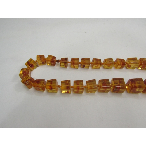 4383 - A faceted Baltic amber necklace, 80cm long   (R) £40