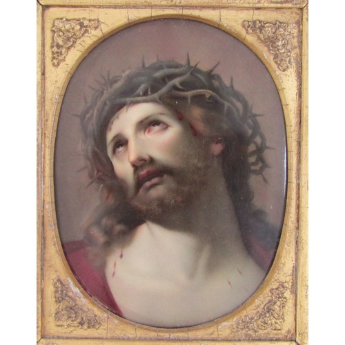 7129 - A late 19th Century hand painted porcelain oval panel depicting Christ, probably by KPM. Set in an o... 