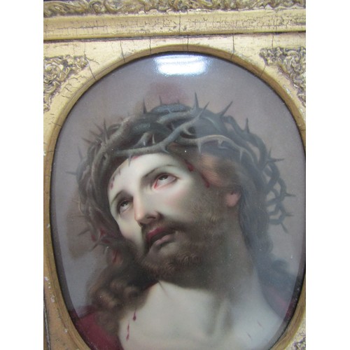 7129 - A late 19th Century hand painted porcelain oval panel depicting Christ, probably by KPM. Set in an o... 