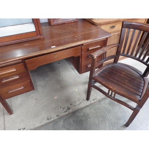 2126 - A mid-century mahogany twin pedestal desk, by Abbess ,seven drawer front, with associated chair