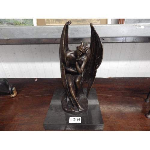 2143 - A bronze figure of a winged demon on marble base, 32cm tall    (R) £150