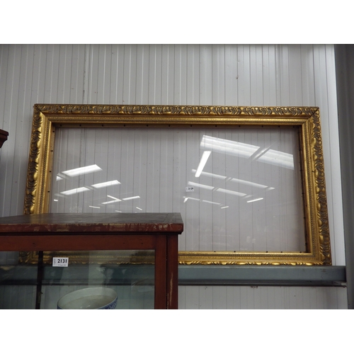 2129 - A double sided ornate gilt picture frame with perspex 80 x 140cm   (R) £15