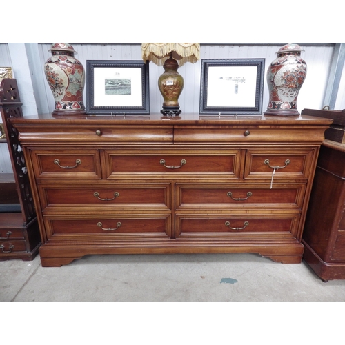 2135 - An American sideboard chest of drawers 163cm wide