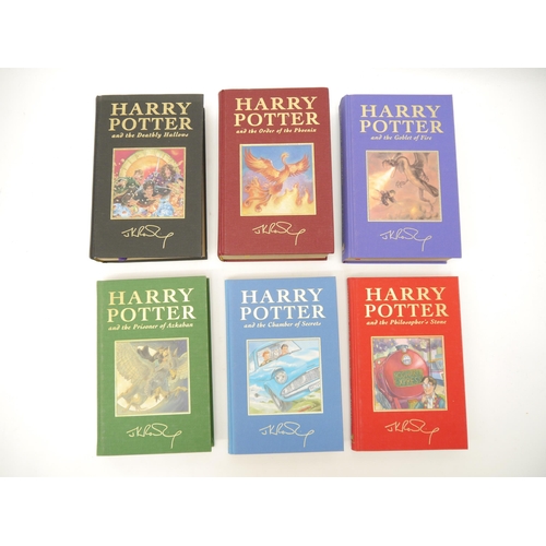 6114 - J.K. Rowling, Harry Potter Novels, deluxe editions, comprising 'Philosopher's Stone; Chamber of Secr... 