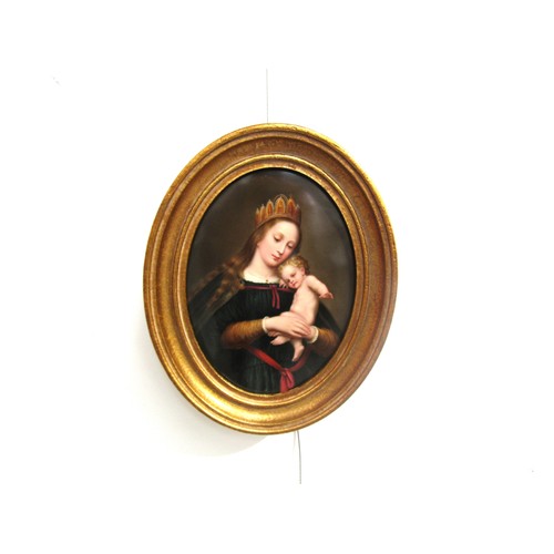 7128 - A gilt framed Berlin Porcelain oval plaque painted with a portrait of the Madonna and Child. Purchas... 