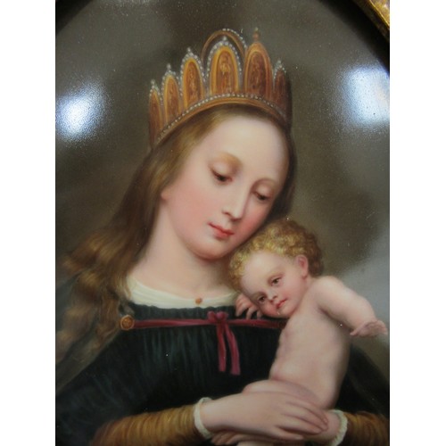 7128 - A gilt framed Berlin Porcelain oval plaque painted with a portrait of the Madonna and Child. Purchas... 