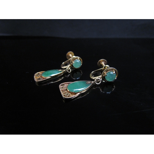 1303 - A pair of jadeite drop earrings with Oriental character marks, 3cm drop, stamped 14k, 4.9g  (E)  £25... 