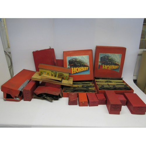1209 - A collection of boxed Hornby '0' gauge model railway including sets, rolling stock, track and access... 