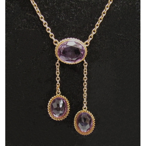 8037 - A circa 1910 amethyst drop necklace, chain stamped 9c, 40cm long, 9.5g