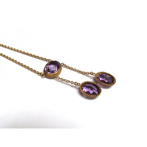 8037 - A circa 1910 amethyst drop necklace, chain stamped 9c, 40cm long, 9.5g