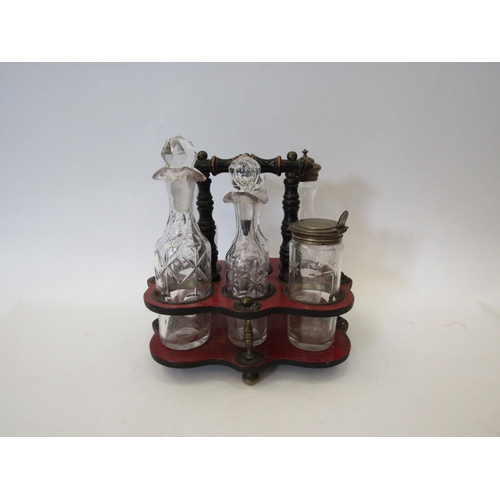 1183 - A Smalls & Hipkiss leather and wood cruet with matching bottles