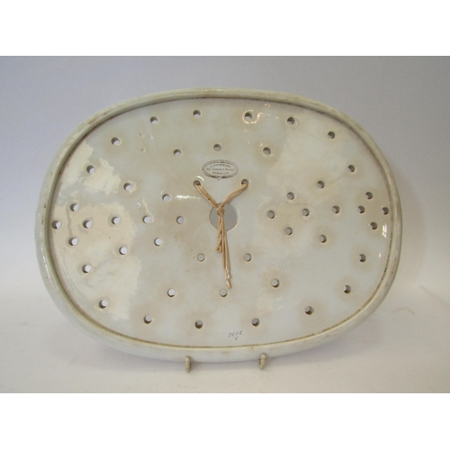 1184 - A drainer stamped J Downing, 22 Market Place, Norwich, hairline crack, 32.5cm long   (R)  £0