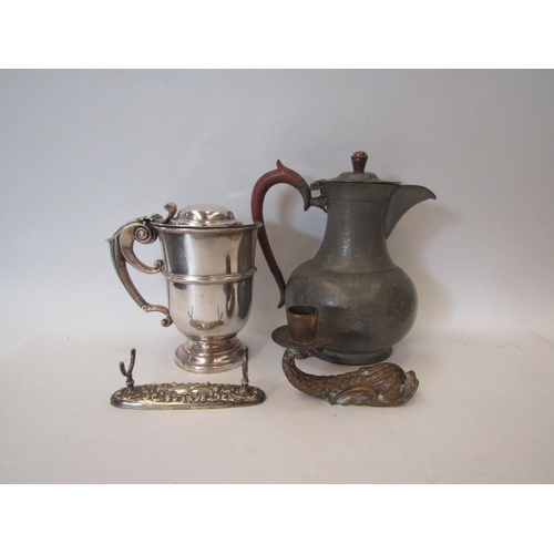 1191 - A pewter jug, a plated tankard and pen rest together with a mythical sea creature form candlestick (... 