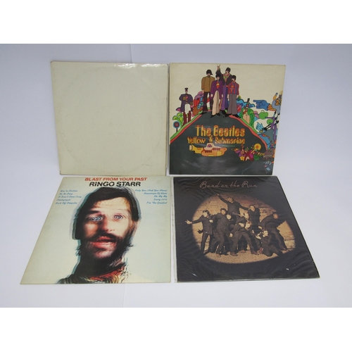 7141 - THE BEATLES: A collection of Beatles and related LP's to include 'The Beatles' (White Album) in embo... 