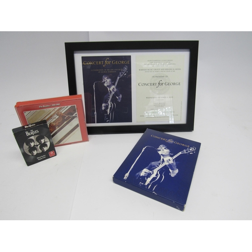 7308 - THE BEATLES: A small group of Beatles and George Harrison memorabilia to include 'Concert For George... 