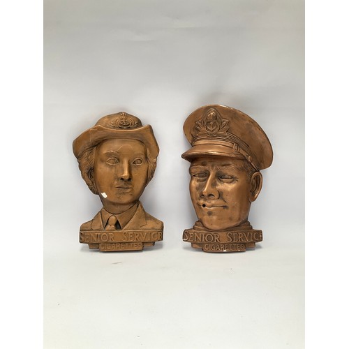 9107 - Two Senior Service gilded plaster heads