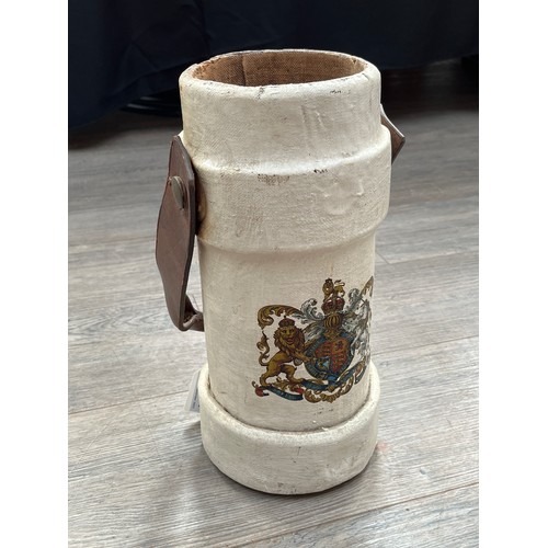 9007 - A George Crown cork shell carrier with brown leather handle, decal intact, painted in white