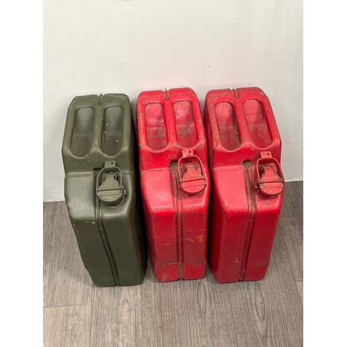 9017 - Three Jerry cans including 1945 diesel and 1950 petrol