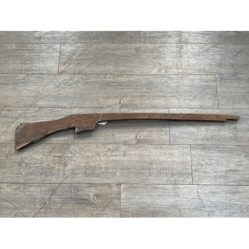 9024 - A wooden rifle, reputedly used by the Home Guard for training