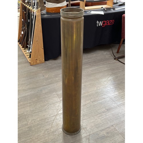 9028 - A post-war 34lb 8oz shell case, large proportions, 118cm tall x 20.5cm diameter at base