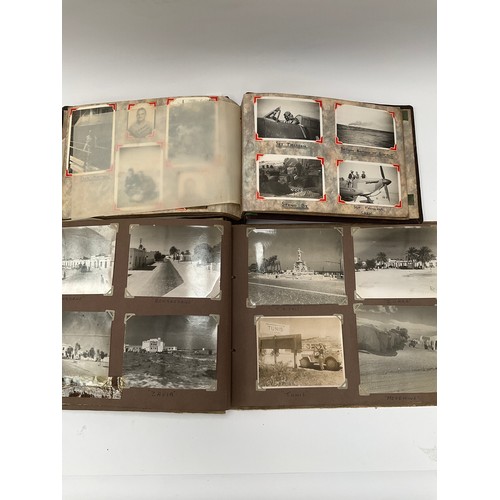 9122 - Two military WWII photograph albums, North Africa, containing images of The King, Churchill, Montgom... 